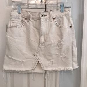 White distressed mini denim skirt